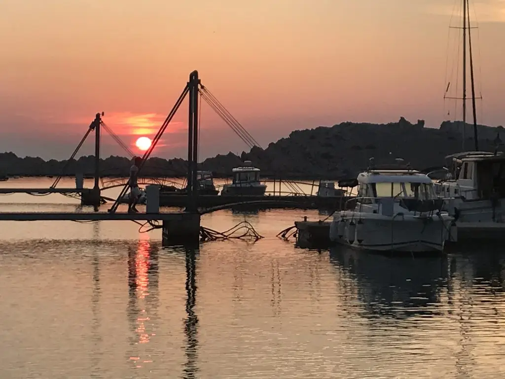 Sunset on the sea during boat trip tour in barca