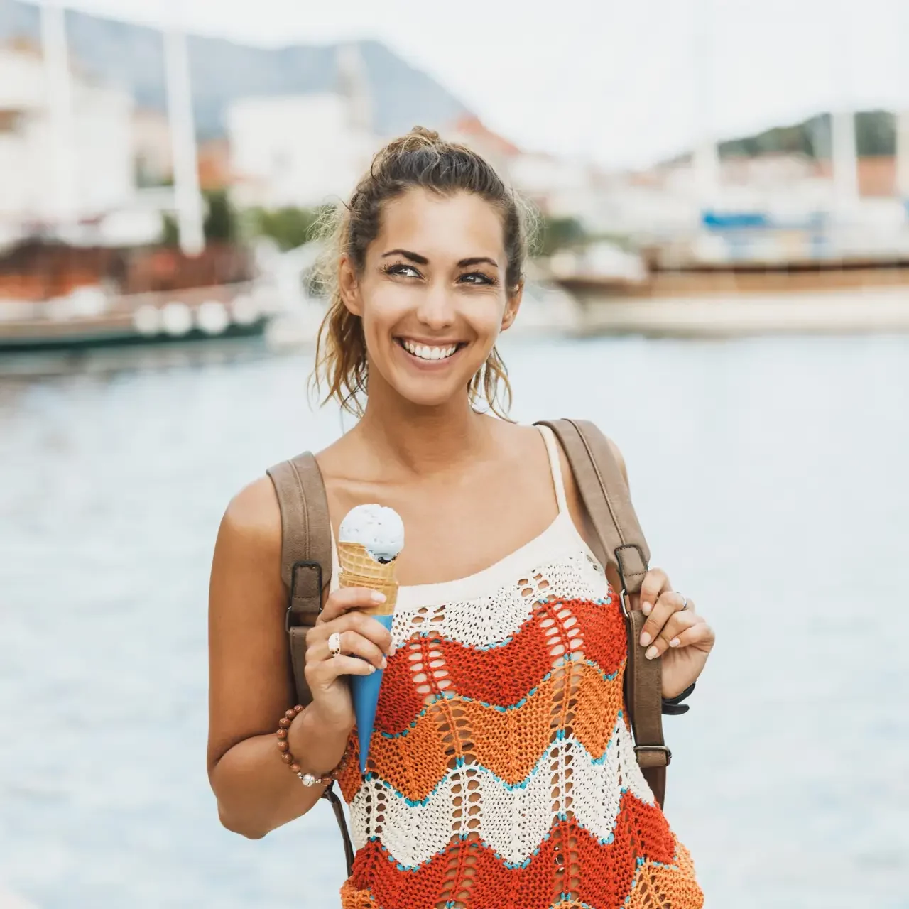 Lady eating icecream in Rabac