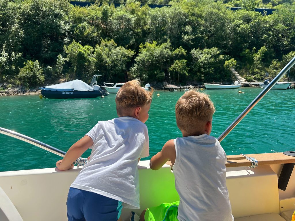kids on a private boat tour in Istria